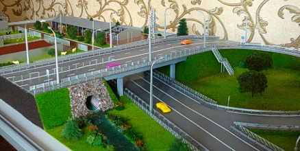 The breadboard model of the road and the farm layout are made in realistic form